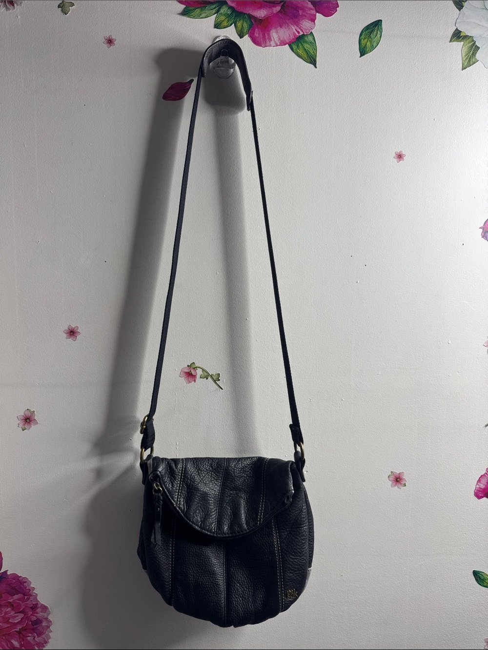 The Sak Black Pebbled Leather Flap Crossbody Bag